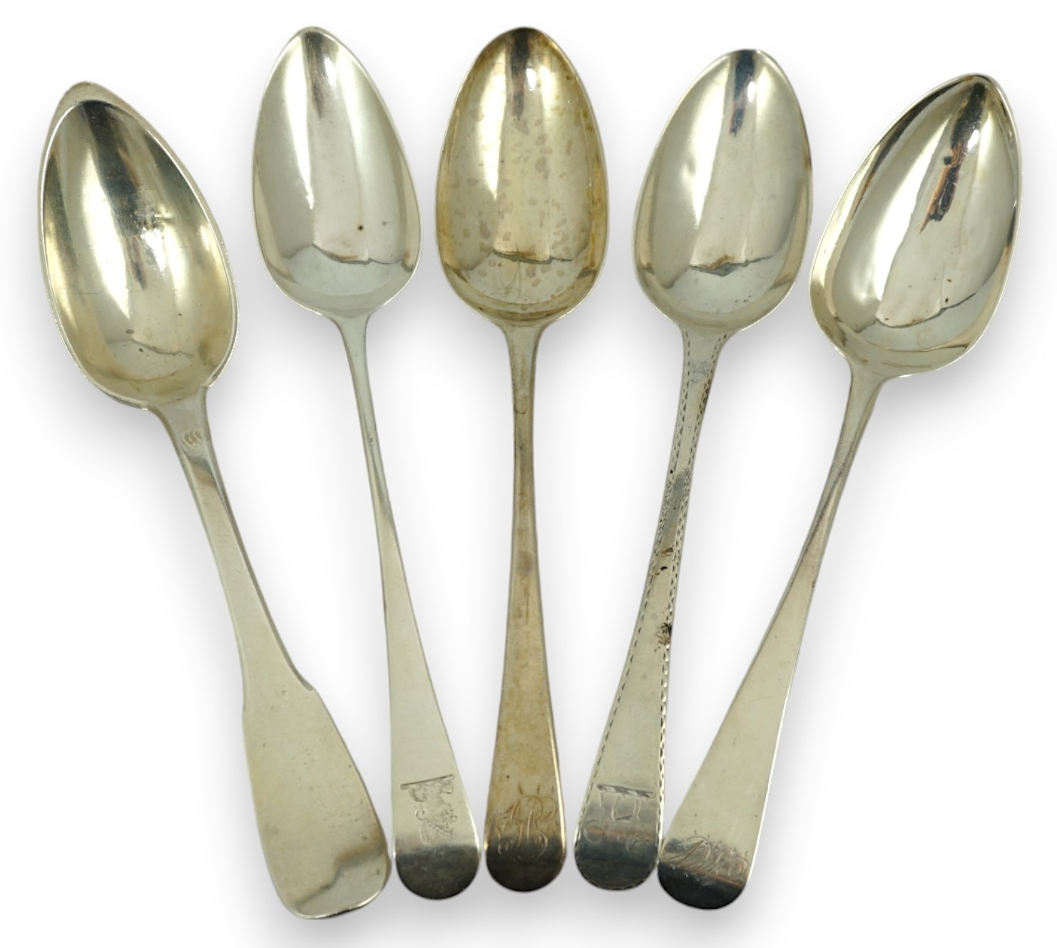 A harlequin collection of 18th and mainly 19th century silver Old English pattern table spoons, various dates and makers, forty five items, together with five similar fiddle pattern table spoons and two French white meta